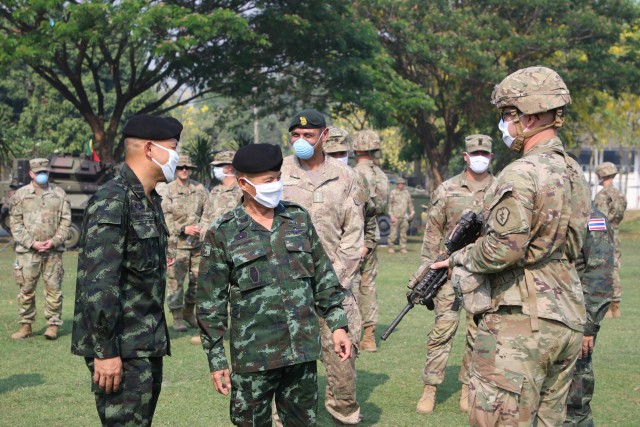 Royal Maj. Gen. Takad Lordsiri, commander of the 9th Infantry Division, speaks with a U.S. Soldier at Fort Kanchanaburi, Thailand, during the opening ceremony of the Hanuman Guardian 20 exercise March 31, 2020. U.S. Army Pacific plans to ramp up its Pacific Pathways exercises later this summer after being temporarily halted due to the COVID-19 pandemic. 