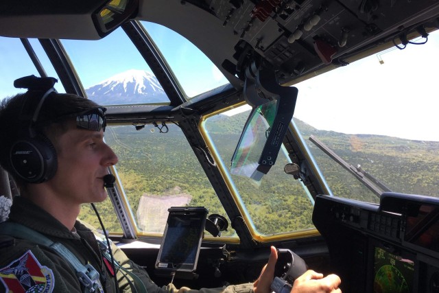 Air Force Capt. Noah Palicia, an instructor pilot stationed in Yokota, Japan, flies a C-130J. He and brother Army Lt. Col. Eric Palicia, an engineer stationed in Wiesbaden, Germany, were selected to appear in the NBC television show “The Titan...