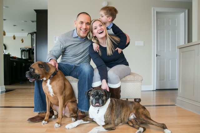 Lt. Col. Robert A. Bassett pictured with his wife; Dr. Blair Hontz, son; Graham, and family Boxers; Olive and Norman. Bassett is currently serving in an Army Reserve Urban Augmentation Medical Task Force that was assigned to Stamford, Connecticut. Bassett is one of more than 1200 Army Reserve medical professionals that have been mobilized as part of the Department of Defense response to COVID-19. (Courtesy Photo)