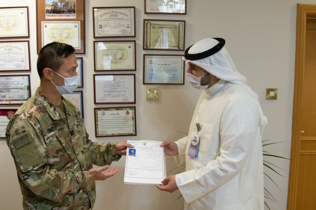 U.S. Army Capt. Yusheng Chen receives Kuwaiti medical