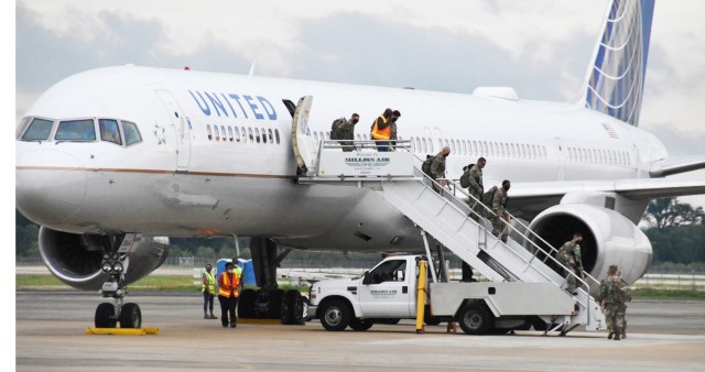 The 4th Security Force Assistance Brigade, from Fort Carson, Colorado, deplane at the Alexandria International airport May 26.