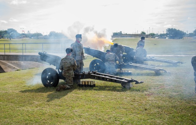 Battery C, 1st Battalion, 82nd Field Artillery Regiment, 1st Armored Brigade Combat Team, fires the cannons during the 13th Expeditionary Sustainment Command’s change-of-command ceremony. Brig. Gen. Darren L. Werner, outgoing 13th ESC Commanding...