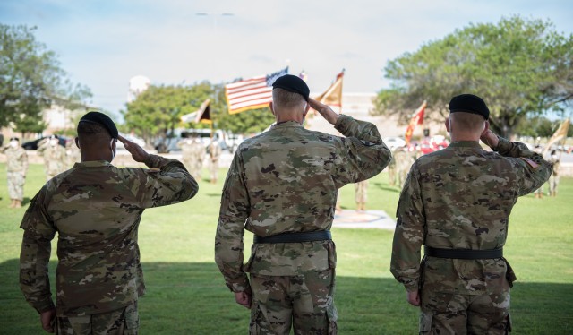 (From left to right) 13th ESC Commanding General, Col. (P) Ronald R. Ragin, Maj. Gen. Scott Efflandt, Deputy Commanding General, III Corps and Fort Hood and outgoing Commanding General, Brig. Gen. Darren L. Werner, salute before passing the...