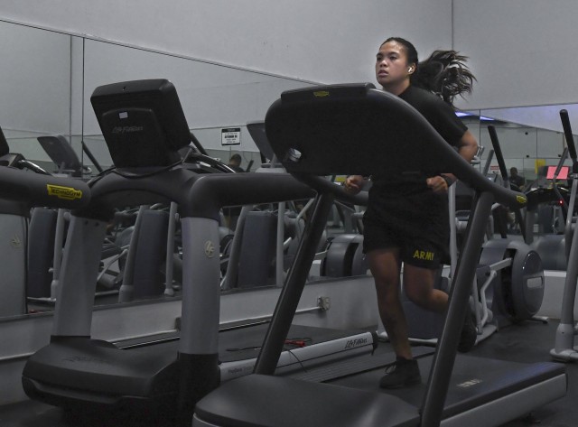 Spc. Francesea Meza of Headquarters, Headquarters Company, 120th Adjutant General Battalion, runs on a treadmill at Fort Jackson’s Coleman Gym May 19. Installation fitness centers and gyms reopened Monday with restrictions to help keep patrons...