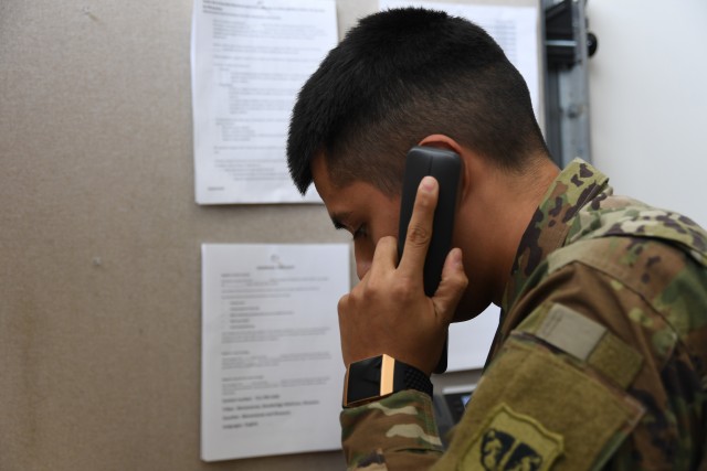 Wisconsin Guard members share test results in many languages