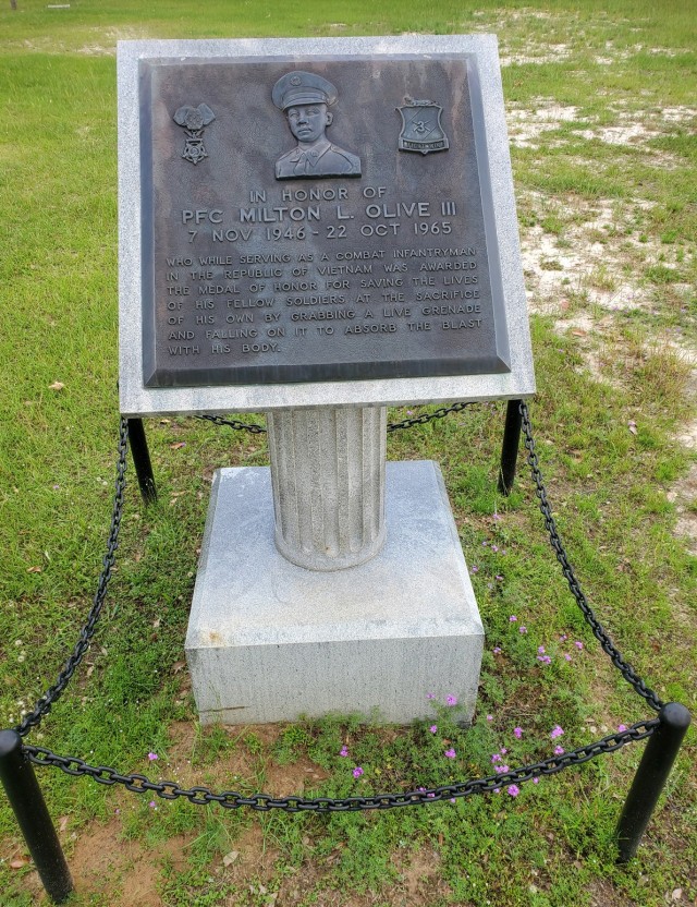 An Honor Field memorial for Pfc. Milton L. Olive III who absorbed the shock of a live grenade, giving his life, to save the lives of his fellow Soldiers while serving in Vietnam.