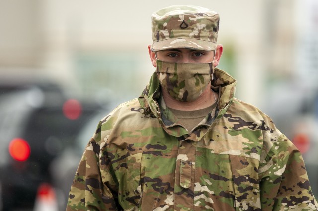 Pfc. Cole Smith, a Soldier with the Delaware Army National Guard’s 262nd Component Repair Company, wears personal protective equipment at a coronavirus testing site on the grounds of the Sussex County VA Community-Based Outpatient Clinic in Georgetown, Delaware, May 6, 2020. The drive-thru event, staffed by members of the Delaware National Guard, Delaware Division of Public Health, Department of Veterans Affairs, Beebe Healthcare, La Red Health Center, Nemours duPont Pediatrics, Westside Family Healthcare, and other organizations, aimed to provide testing for essential employees, at-risk populations, and individuals likely exposed to someone with COVID-19. 