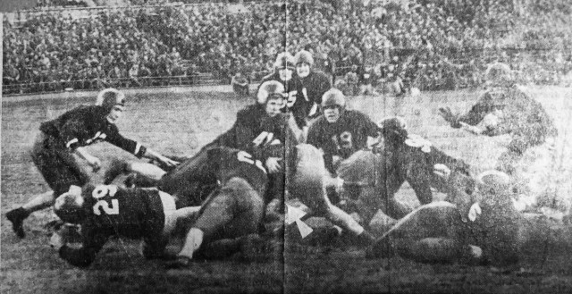 Mike Rauseo, number 19, a 1st Armored Division Soldier and heavy truck driver during World War II, helps the 1AD football team during a match against the 78th Infantry Division. Rauseo was a skilled athlete who represented 1AD in boxing, football, baseball, softball and other sports, with his 1AD football career culminating in an appearance as a quarterback at the Army Football all-star game at Olympic Stadium, Berlin, Nov. 16, 1945. (Courtesy photo)