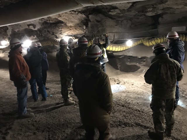 A team tours the Permafrost Tunnel Research Facility, located in Fox, Alaska to learn how the ground in Arctic environments is different than other areas – the areas may have ice wedges, ice lenses and other features not found elsewhere.