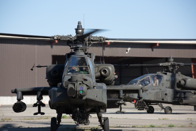 Soldiers assigned to the Utah National Guard's 1st Battalion, 211th Aviation Regiment, depart Army Aviation Support Facility in West Jordan, Utah, May 7, 2020. The battalion, comprised of three companies of AH-64 Apache helicopters and more...