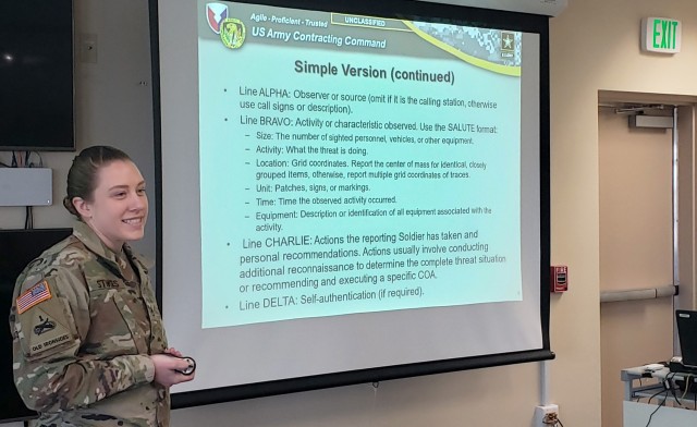 Staff Sgt. Debra Stokes conducts training on Army Warrior Tasks for members of the 923rd Contracting Battalion earlier this year at Fort Riley, Kansas. She is providing instruction on submitting concise situation and spot reports over radio...