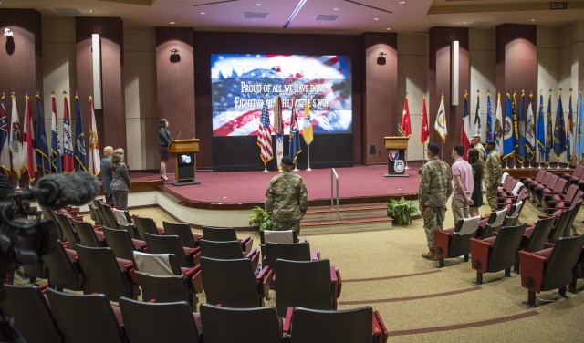 As part of Army tradition, the audience sings the Army song at the conclusion of the U.S. Army Security Assistance Command's relinquishment of command ceremony, 2 June 2020, at Redstone Arsenal, AL. Maj. Gen. Jeffrey Drushal, U.S. Army Security Assistance Command's commanding general, relinquishes command to Dr. Myra  Gray, USASAC's Senior Executive Service officer and  deputy to the commanding general, who will assume Executive Director duties.  Lt. Gen. Edward Daly, deputy commanding general of Army Materiel Command, hosted the virtual event to a socially distanced audience with widespread online presence live-streamed through social media. (Photo by Richard Bumgardner, USASAC Public Affairs)