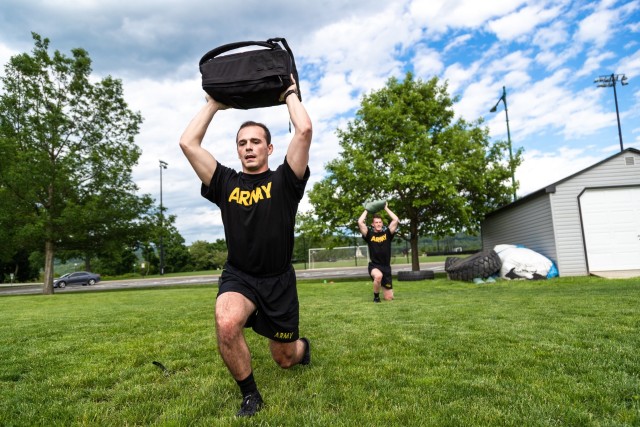 2LT Nick Meuier conducts PT with his roommate 2LT Taggart Solomon, June 1, 2020.