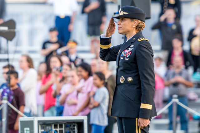 Lt. Gen. Nadja Y. West, the 44th Surgeon General of the United States Army and commanding general, U.S. Army Medical Command renders honors during a Twilight Tattoo performance, on Summerall Field, Joint Base Myer Henderson-Hall, Va., May 9, 2019. West hosted the performance which featured Soldiers assigned to the 3d U.S. Infantry Regiment (The Old Guard) and The U.S. Army Band "Pershing's Own". Twilight Tattoo is an hour-long pageant, which showcases the history of the U.S. Army. (U.S. Army photos by Sgt. Nicholas T. Holmes)