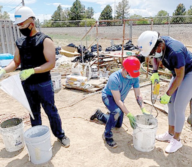 COLORADO SPRINGS, Colo. — Better Opportunities for Single Soldiers (BOSS) volunteers assist Habitat for Humanity with a veteran home build in Colorado Springs Sept. 21, 2019. (Courtesy photo)