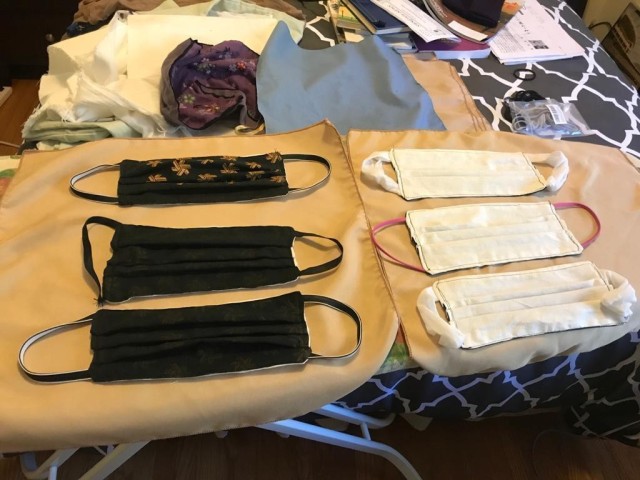 Miyuki Kamada shows off the masks she created for service members stationed in Kuwait, at San Bruno, California, April 8, 2020. Kamada produced the masks as a way to give back to her country and to deployed service members, whose job she...