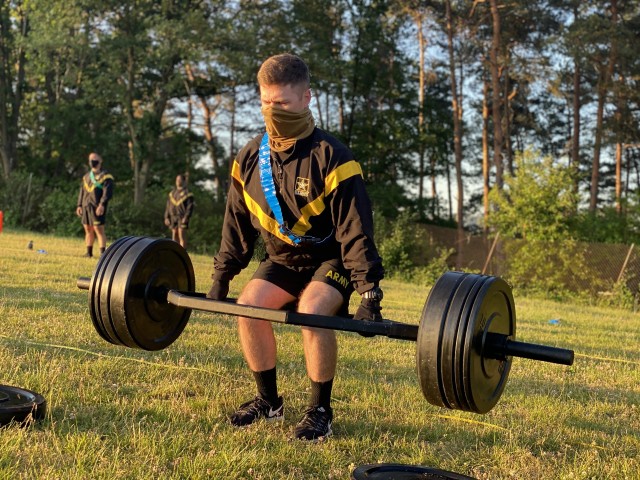 RHINE ORDNANCE BARRACKS, Germany - 2nd Lt. Garrett Julian, support platoon leader assigned to Charlie Battery, 5th Battalion, 7th Air Defense Artillery Regiment conducts a dead lift during the European Best Defender Competition, on Rhine Ordnance...