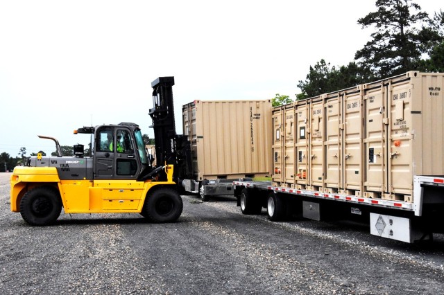 Unloading containers May 28 at a temporary 4th SFAB motorpool setup at the Joint Readiness Training Center and Fort Polk for Rotation 20-08.