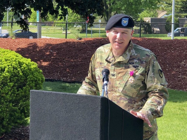 Col. Jeffrey Witt, Chief of Staff for Tank-automotive and Armaments Command, bids a farewell to a small gathering of the TACOM staff during his retirement ceremony at the Detroit Arsenal June 5.  The small ceremony was held outside to ensure...