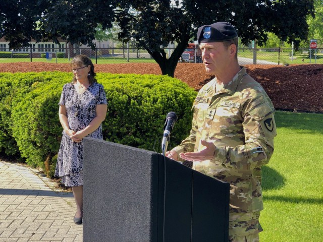 Maj. Gen. Dan Mitchell (right), commanding general Tank-automotive and Armaments Command, hosted a retirement ceremony for his Chief of Staff, Col. Jeffrey Witt (not pictured) as the Deputy Chief of Staff, Annette Riggs, looks on.  The ceremony...