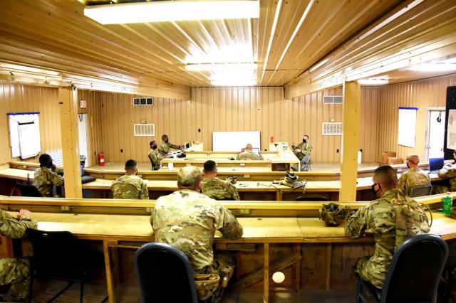 4th SFAB Tactical Operations Center discusses safety issues during a morning brief on May 28 while adhering to COVID-19 social-distancing guidelines.