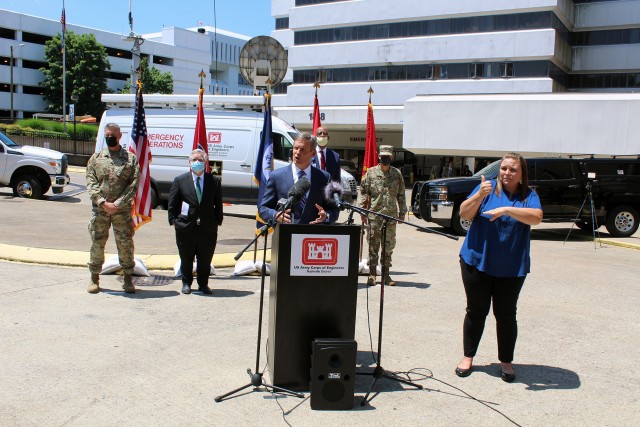 Tennessee Governor Bill Lee talks to attendees during an Alternate Care Site construction turnover ceremony at the Nashville General Hospital project June 5, 2020.