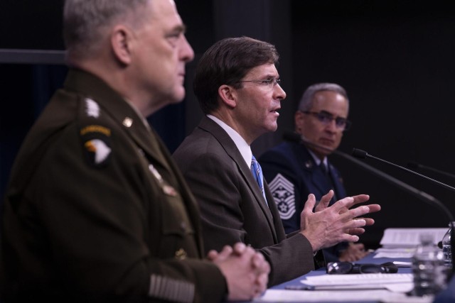 Mark Esper, center, Defense secretary; Army Gen. Mark A. Milley, chairman of the Joint Chiefs of Staff, left, and Senior Enlisted Adviser to the Chairman Ramón “CZ” Colón-López answer questions regarding DoD policy on COVID-19, during a virtual global town hall at the Pentagon, May 28.