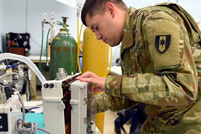 A Soldier repairs a medical device at the U.S. Army Medical Materiel Agency’s Medical Maintenance Operations Division at Tobyhanna Army Depot in Pennsylvania.