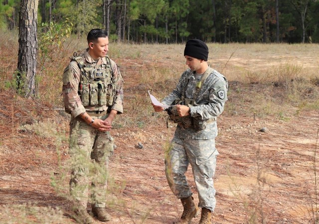 Sgt. 1st Class Jeremiah Velez, left, an advisor with 3rd Squadron, 1st Security Force Assistance Brigade, works with a simulated foreign partner during a field training exercise in October 2019 at Fort Benning, Ga. The exercise helped prepare 3rd Squadron for future advising missions anywhere in the world to include Colombia.