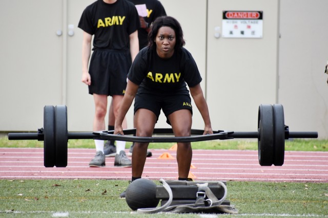 Staff Sgt. Sharonica White, assigned to U.S. Army Garrison Japan, completes a deadlift repetition during the U.S. Army Japan 2020 Army Week’s Army Combat Fitness Test Fitness Warrior Competition at Camp Zama, Japan, June 8.