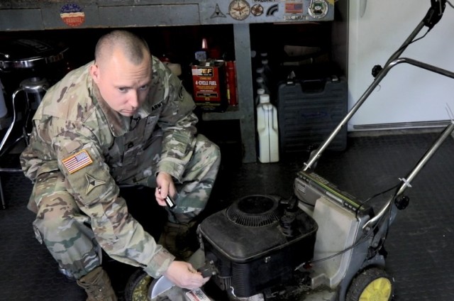 As a wheeled vehicle mechanic and full-time admin NCO for the 642nd Aviation Support Battalion in Rochester, New York, Sgt. 1st Class Joseph Maloney helps around the armory every way he can. Here he tunes up a lawnmower May 19, 2020.