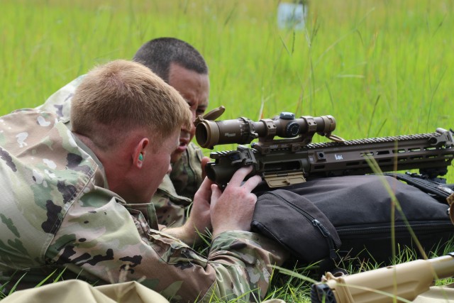 Sgt. Zachery Goin and Staff Sgt. Eric Cortez, from the 10th Brigade Engineer Battalion, 1st Armored Brigade Combat Team, 3rd Infantry Division, conduct a field expedient bore sight at the Fort Stewart, Ga., sniper range while fielding the U.S....