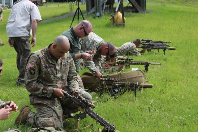 Soldiers from the 1st Armored Brigade Combat Team, 3rd Infantry Division, conduct weapons maintenance at the Fort Stewart, Ga., sniper range while fielding the U.S. Army’s new M110A1 Squad Designated Marksman Rifle, June 5th, 2020. 1ABCT was the...