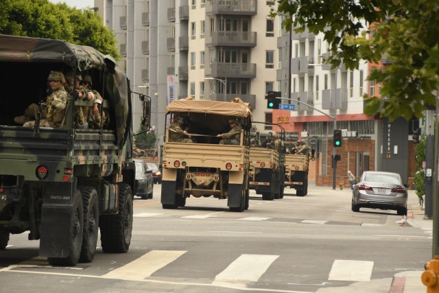 California National Guardsmen leave downtown Los Angeles in Light Military Tactical Vehicles on June 5, 2020 during civil unrest operations. (U.S. Army photo by Capt. Jason Sweeney, 79th Infantry Brigade Combat Team)