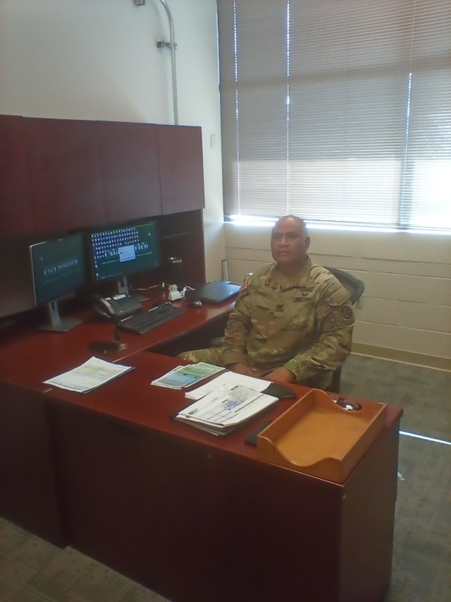 Col. Kenneth Tafao, the new 9th MSC Chief of Staff, getting settled in his new office.