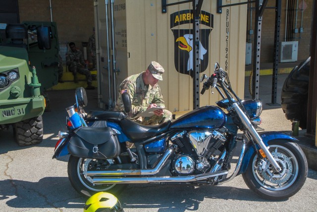 Staff Sergeant Daniel Cameron, 1st Brigade Combat Team’s Motorcycle Safety Mentor, recently conducts a motorcycle safety check.