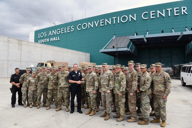 Los Angeles Police Chief Michel Moore meets with the California National Guard's 40th Infantry Division Deputy Commander Brig. Gen. Michael Leeney and leadership from Joint Task Force-79 (JTF-79) on June 6, 2020, at the Los Angeles Convention...