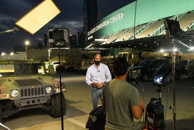 NBC News reporter Miguel Almaguer reports live for the Today Show about Cal Guard operations on June 3, 2020 at the Los Angeles Convention Center. (U.S. Army photo by Capt. Jason Sweeney, 79th Infantry Brigade Combat Team)