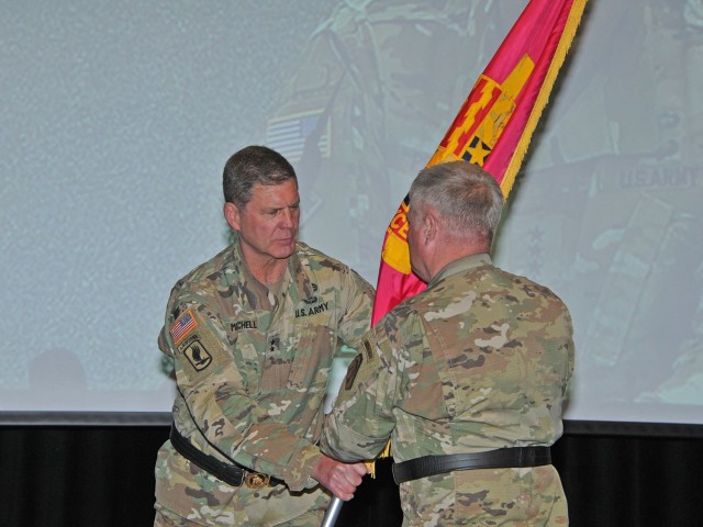 Maj. Gen. Dan Mitchell (left), outgoing commanding general Tank-automotive and Armaments Command, relinquishes command to Maj. Gen. Brian Cummings, Program Executive Officer Ground Combat Systems, who was standing in for Gen. Gus Perna during a virtual change of command June 12 at the Detroit Arsenal, Michigan.