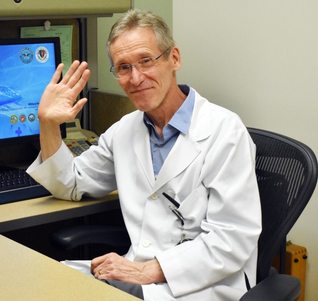 Dr. Timothy Russell, who will retire in July after 36 years at the BG Crawford F. Sams U.S. Army Health Clinic, waves goodbye to the community at Camp Zama, Japan, June 4.