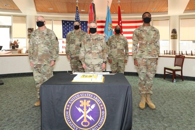 The U.S. Army Intelligence and Security Command (INSCOM) celebrates the 245th Army Birthday with a ceremony recognizing the U.S. Army’s legacy of defending and protecting America at Fort Belvoir, Virginia, June 9. The event, which includes a special cake-cutting ceremony, is celebrated annually throughout the Army and typically invites the oldest, or wisest, and youngest members of the command to cut a birthday cake with a ceremonial saber. (From left to right) Col. Howard F. Cantrell, INSCOM chaplain; Chief Warrant Officer 5 Kevin G. Boughton, INSCOM command chief warrant officer; Maj. Gen. Gary W. Johnston, INSCOM commanding general; Sgt. Maj. Stanley L. Hall, Jr., INSCOM acting command sergeant major; and Pfc. Tyrell I. Jones, supply specialist, participated in the ceremony.