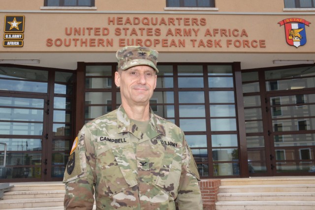 Col. Douglas Ray Campbell, the most senior Soldier within the Vicenza Military Community, poses for a photo in front of the United States Army Africa / South European Task Force headquarters on Caserma Del Din, Vicenza, June 11, 2020. Campbell joined the Army in 1985 at Fort Leonard Wood, MO. Throughout his 35 years of service, he spent half of his career overseas. His assignments include several tours in Korea, Thailand, Italy, Germany, and Afghanistan.