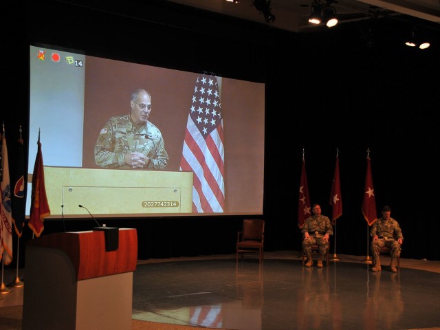 Gen. Gus Perna, commanding general Army Materiel Command, addresses the small crowd during a virtual change of command June 12 at the Detroit Arsenal, Michigan.  Brig. Gen. Darren Werner (seated left) assumed command of Tank-automotive and...