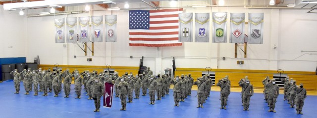 Soldiers with the 32nd Hospital Center’s Task Force Vanguard participate in a ceremony June 8 prior to their deployment for a nine-month tour to Iraq. The unit will assume a combat support hospital role in Iraq.
