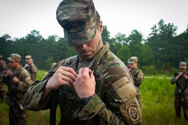 A paratrooper assigned to the 3rd Brigade Combat Team, 82nd Airborne Division pins his Expert Infantryman Badge upon himself during a COVID-19 modified ceremony held Saturday, June 13, 2020 on Fort Bragg, North Carolina.

After the train up and testing phases, 109 paratroopers pinned their Expert Infantryman Badges and 22 pinned their Expert Soldier Badges, marking the first time soldiers assigned to U.S. Army Forces Command earned the badge.