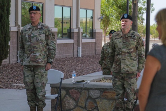 Brig. Gen. Johnny Davis (left) and Col. Tobin Magsig stand during Joint Modernization Command's change of command ceremony on June 15 in front of JMC headquarters on Fort Bliss, Texas. Col. Magsig is the commander of JMC. (Photo by Cpl. William Dickinson)
