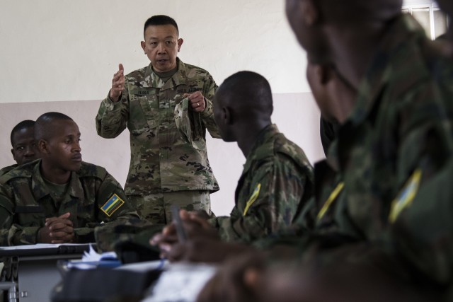 U.S. Army Brig. Gen. Lapthe Flora, deputy commanding general for U.S. Army Africa, briefs Rwandan Soldiers during MEDRETE 18-5 at the Rwanda Military Hospital, Kigali, Rwanda, Aug. 20, 2018. MEDRETE 18-5 is the first combined effort for a medical readiness training exercise between the Rwandan government and U.S. Army Africa. The exercise is part of a series of medical readiness training that U.S. Army Africa is scheduled to facilitate within various countries in Africa, and serves as an opportunity for the partnered militaries to hone and strengthen their general surgery and trauma skills while reinforcing the partnership between the countries.
(U.S. Air Force photo by Tech. Sgt. Larry E. Reid Jr.)