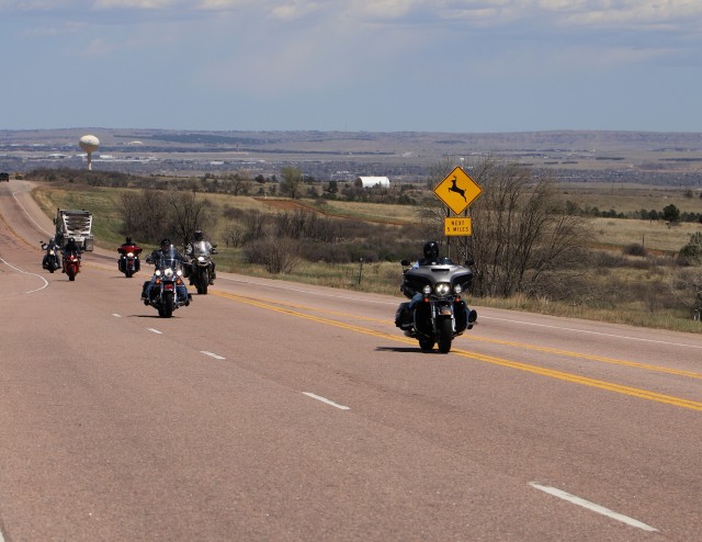 Riders from throughout 4th Sustainment Brigade, 4th Infantry Division stage their motorcycles and gear at the start of a brigade level motorcycle mentorship ride May 1 in the 68th Combat Sustainment Support Battalion’s parking lot on Fort Carson, Colorado. The mentorship ride allows leaders the opportunity to see the skill level of their riders, inspect the personal protective equipment and help train new riders. (U.S. Army photo by Sgt. James Geelen, 4th Sustainment Brigade Public Affairs Office, 4th Infantry Division)