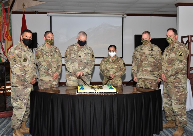 The US Army Garrison Fort Buchanan commemorated the 245th United States Army Birthday in a virtual event held at the installation’s Community Club and Conference Center June 12, 2020. The virtual event, streamed live on Facebook, was hosted by Garrison Commander Col. Joseph B. Corcoran III. The Army Birthday Cake Cutting Ceremony was conducted with the “wisest” Soldier, Garrison Command Chaplain, Lt. Col. Mark A. East, joined by the youngest Soldier, Private 1st Class Yareilys S. González with the 215th MP Co., 1st MSC; Col. Corcoran, Brig. Gen. Jurasek, Command Sgt. Maj. Quintana and Command Sgt. Maj. Breck.