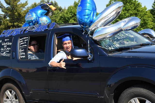 An outpouring of support stretched for miles as Fort Drum community members celebrated Class of 2020 graduates June 18 with a commencement parade. Dozens of high school seniors and their family members drove across post in vehicles decorated with...